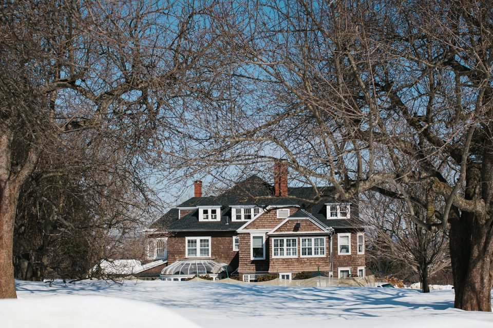 Winter Weddings at Tarrywile view of mansion across snow laden lawn