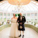 Day Two of Triple Header bride-groom-standing-in-conservatory