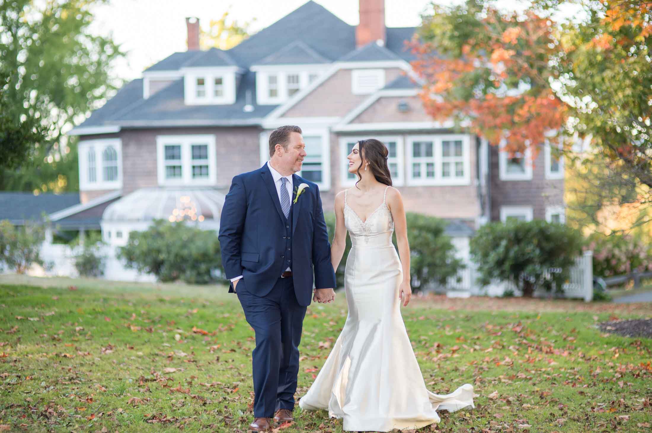 A Vineyard Style Wedding bride-groom-walking-across-lawn-at-vineyard-style-wedding